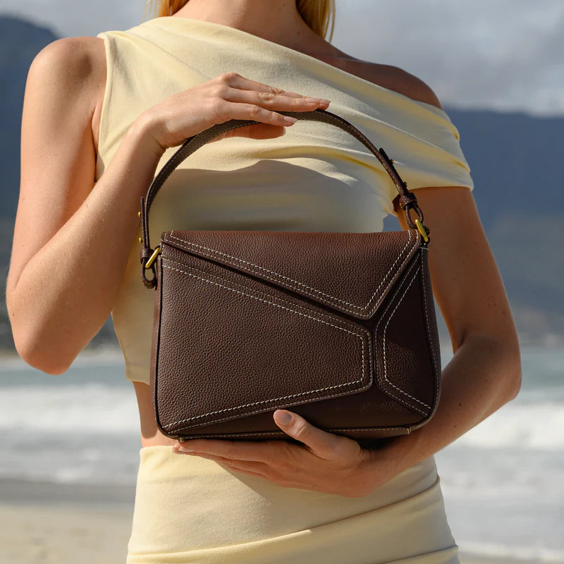 The Lotus Leather Sling Handbag in Pure Leather