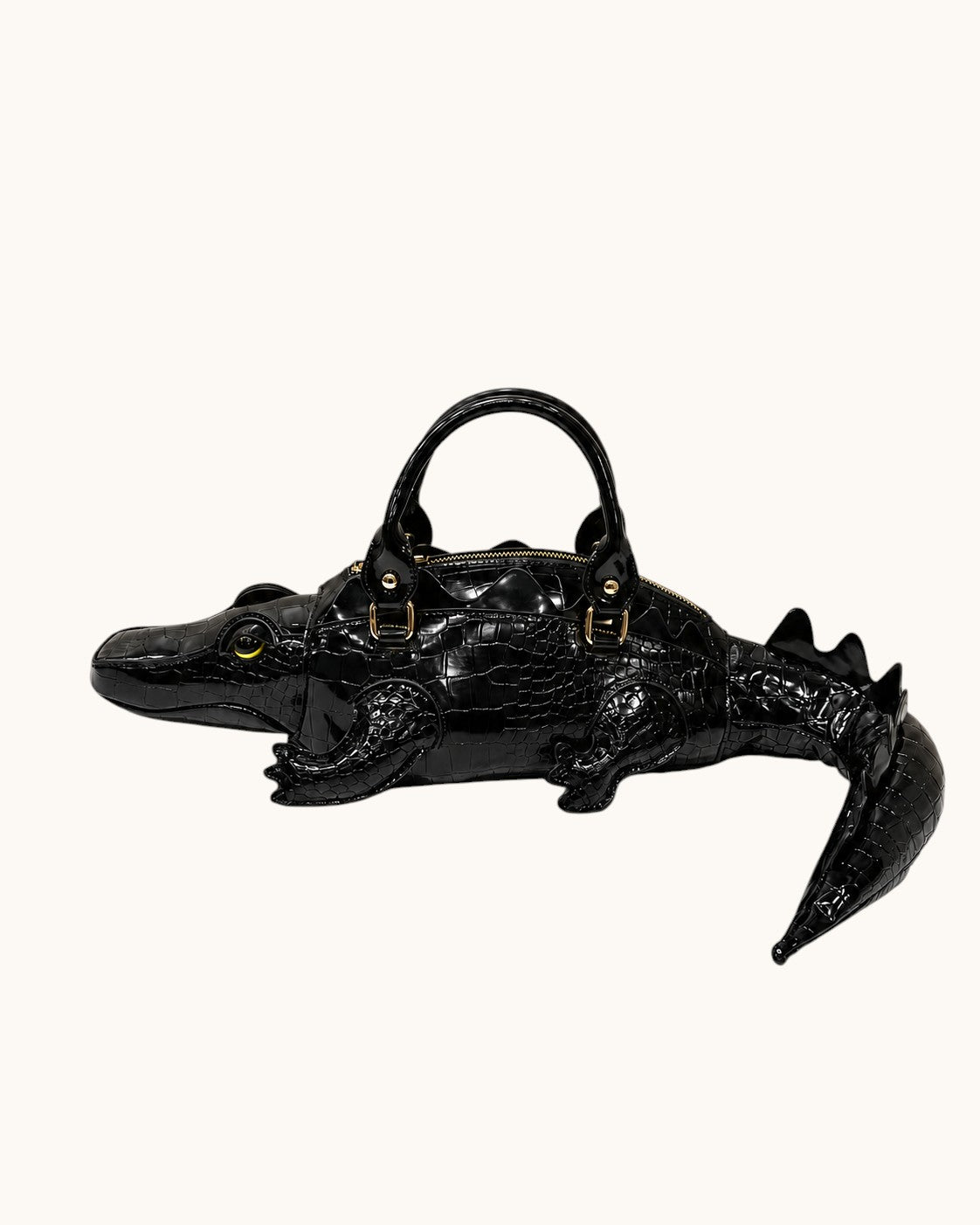 Pine Drew India Crocetta Ćlan mini handbag in black croc-embossed vegan leather with a unique alligator-shaped design.