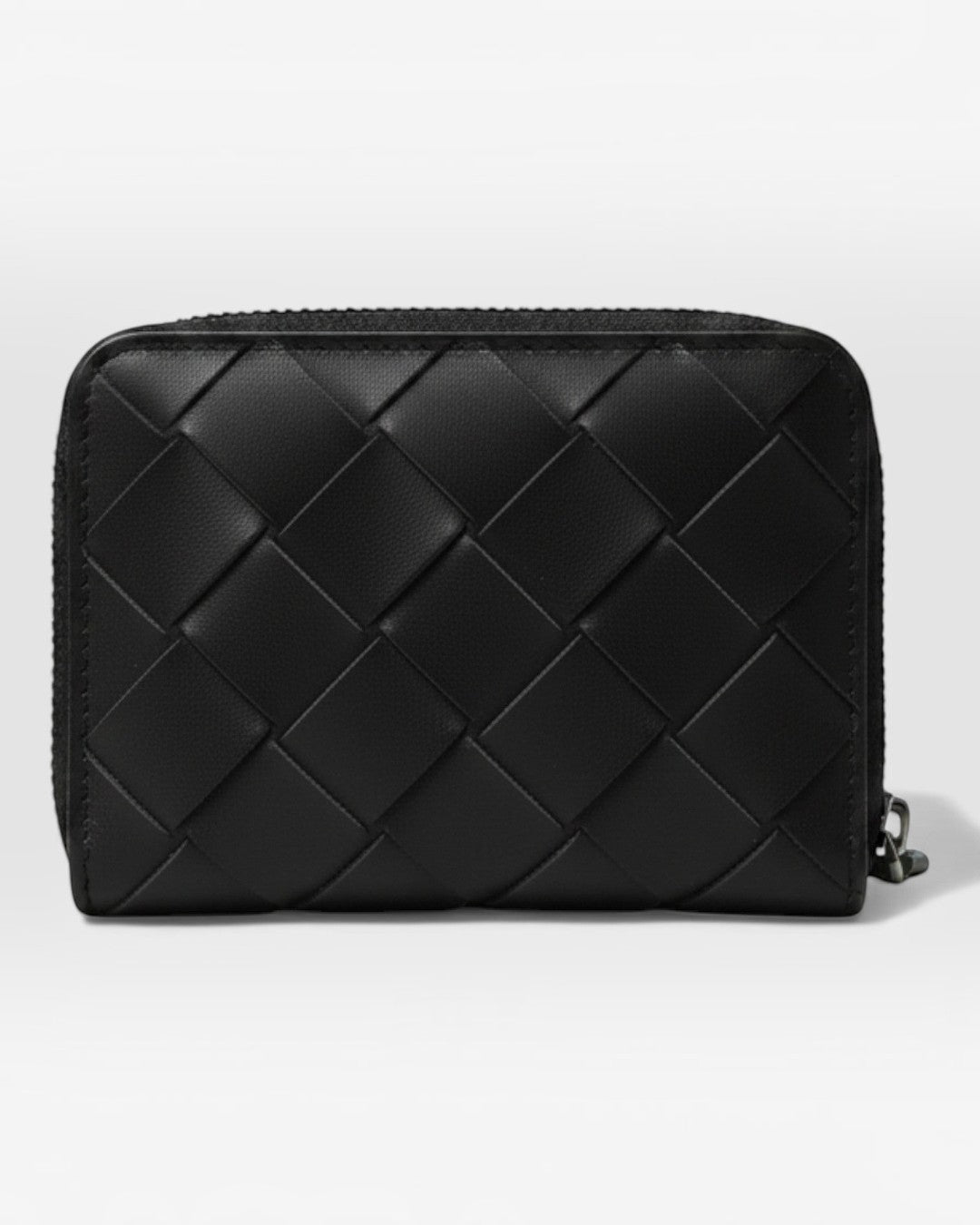 Pine Drew India Caden Interlace zip wallet in black woven leather with a structured, compact silhouette.