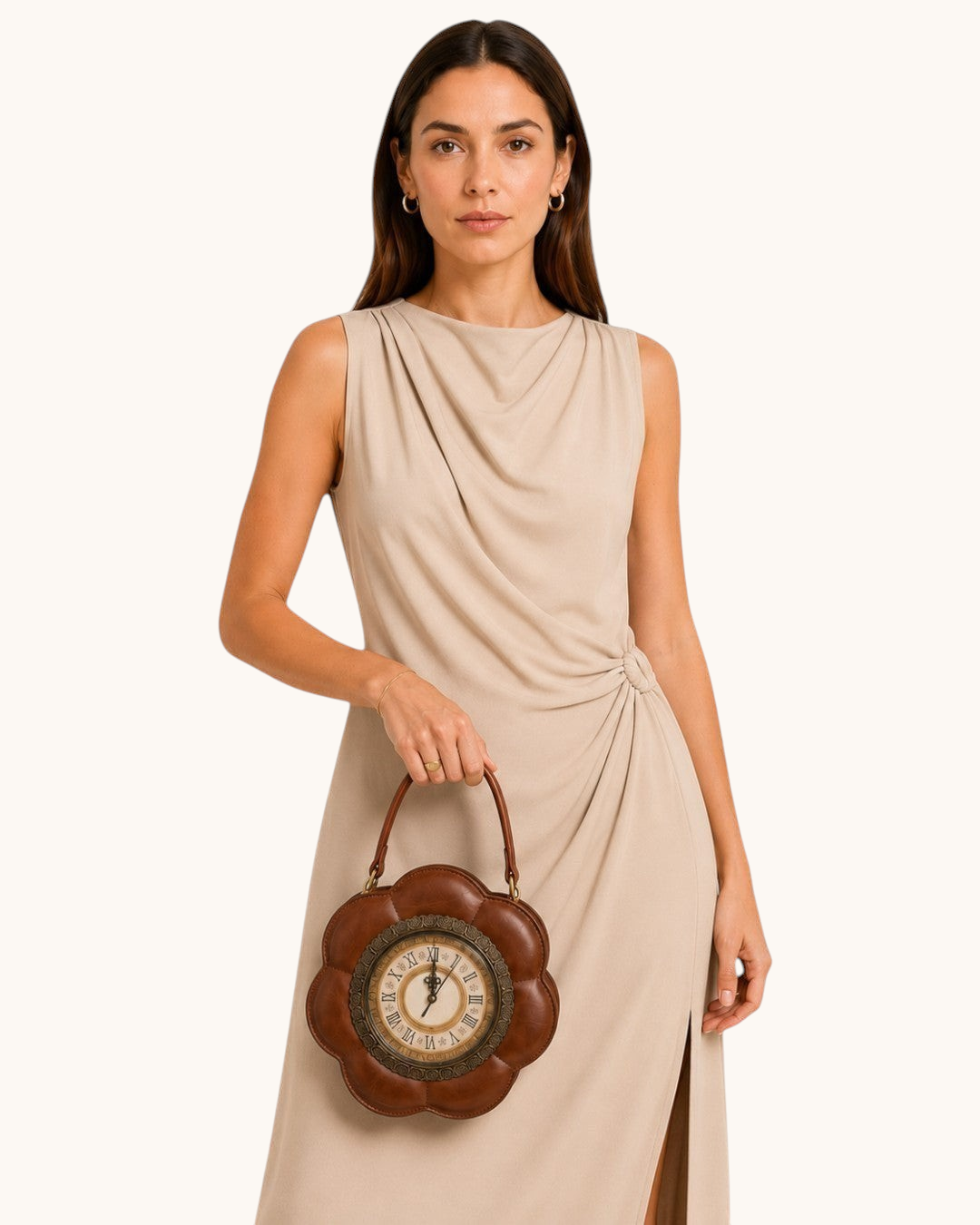 Pine Drew India Tempus Elan cognac vegan leather flower-shaped handbag with an antique clock face held by a model.