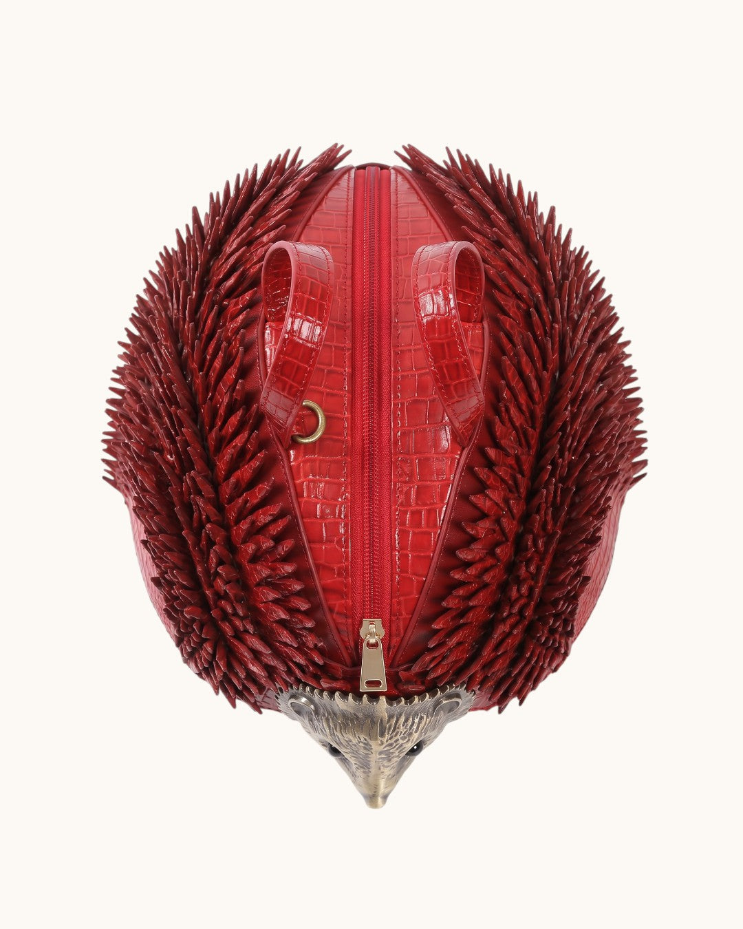 Pine Drew India Epinelle Mini deep crimson croc-embossed vegan leather hedgehog bag with sculpted spines and gold zipper