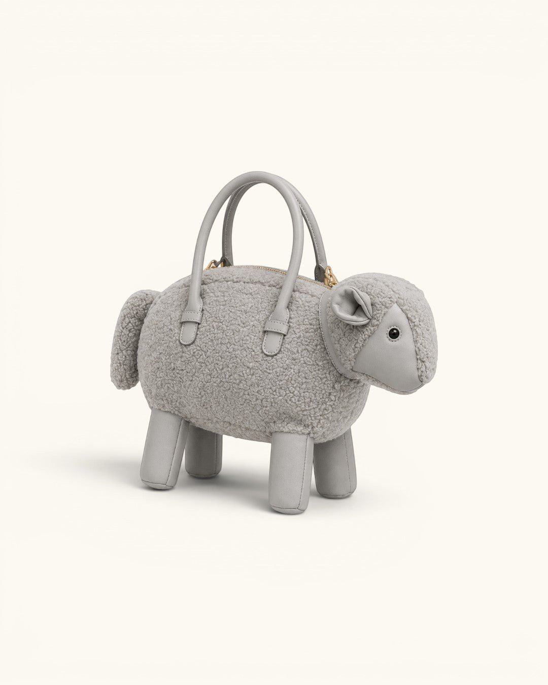 Pine Drew India grey sheep-shaped mini bag in teddy shearling vegan leather with structured top handles and gold hardware