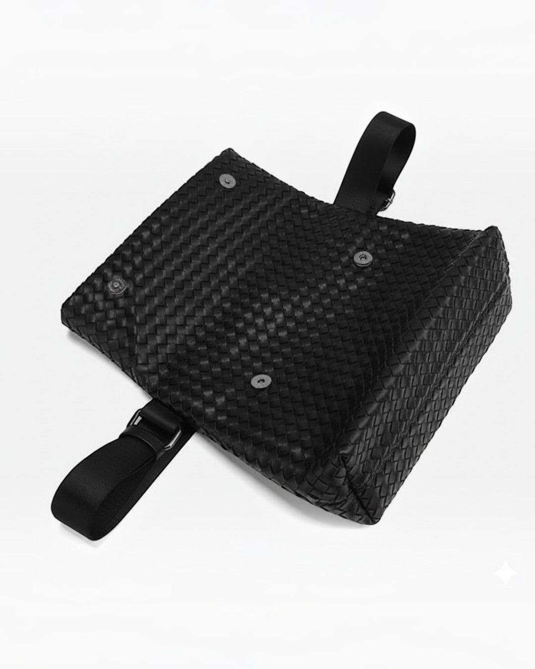 Pine Drew India Ravello black vegan leather crossbody bag with signature woven texture and adjustable shoulder strap.