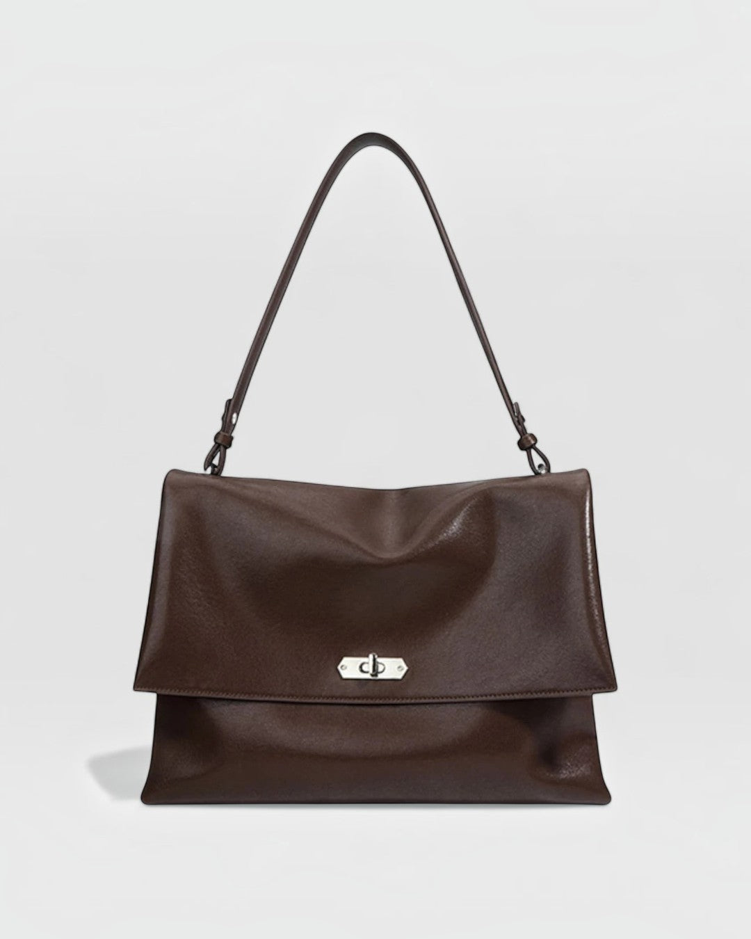 Pine Drew India The Vivienne Fold shoulder bag in Cacao Luxe full-grain leather with silver twist-lock hardware.
