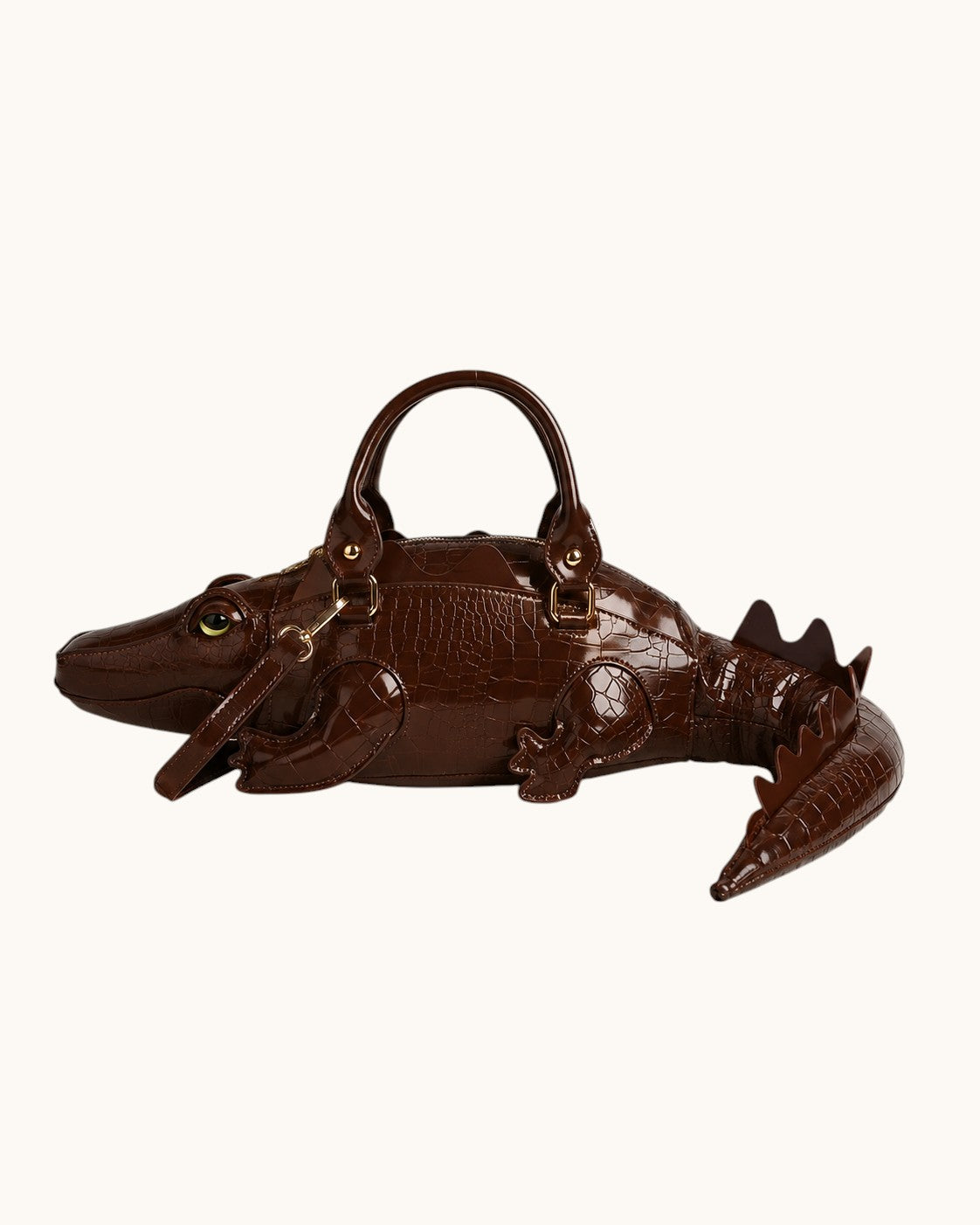 Pine Drew India Crocetta Élan mini handbag in dark brown croc-embossed vegan leather with a sculptural alligator shape.