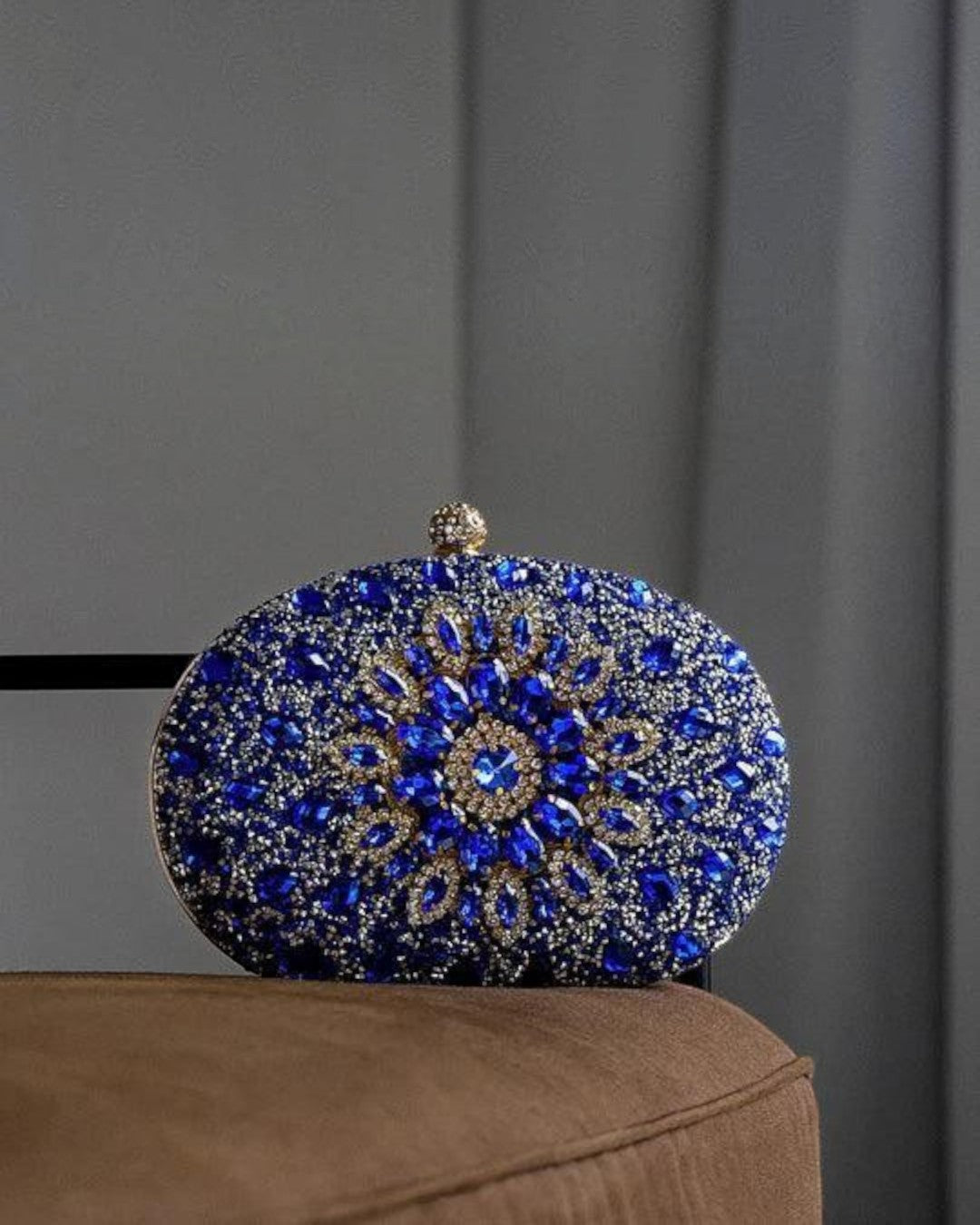 Pine Drew India Colette clutch bag featuring a blue diamond-encrusted floral pattern on a polyester evening purse.