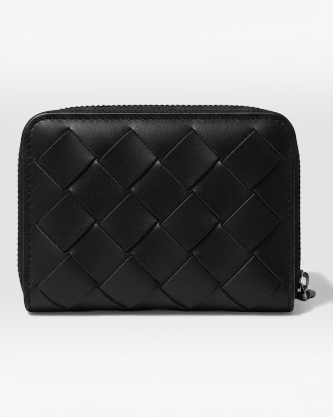 Pine Drew India Caden Interlace zip wallet in black woven leather with a structured, compact rectangular silhouette.