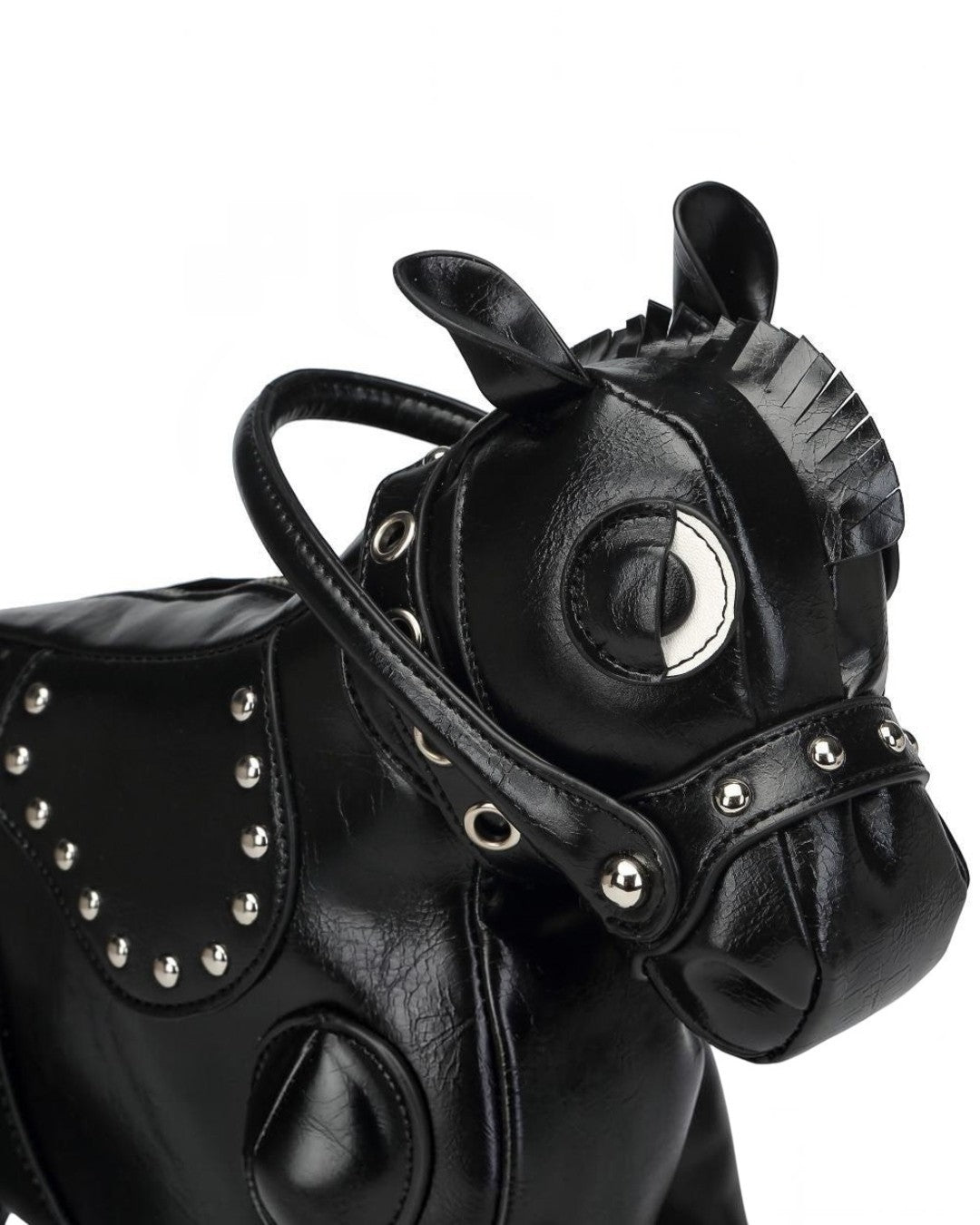 Pine Drew India Cavallo handbag in black vegan leather shaped like a horse with silver stud details and fringe mane.