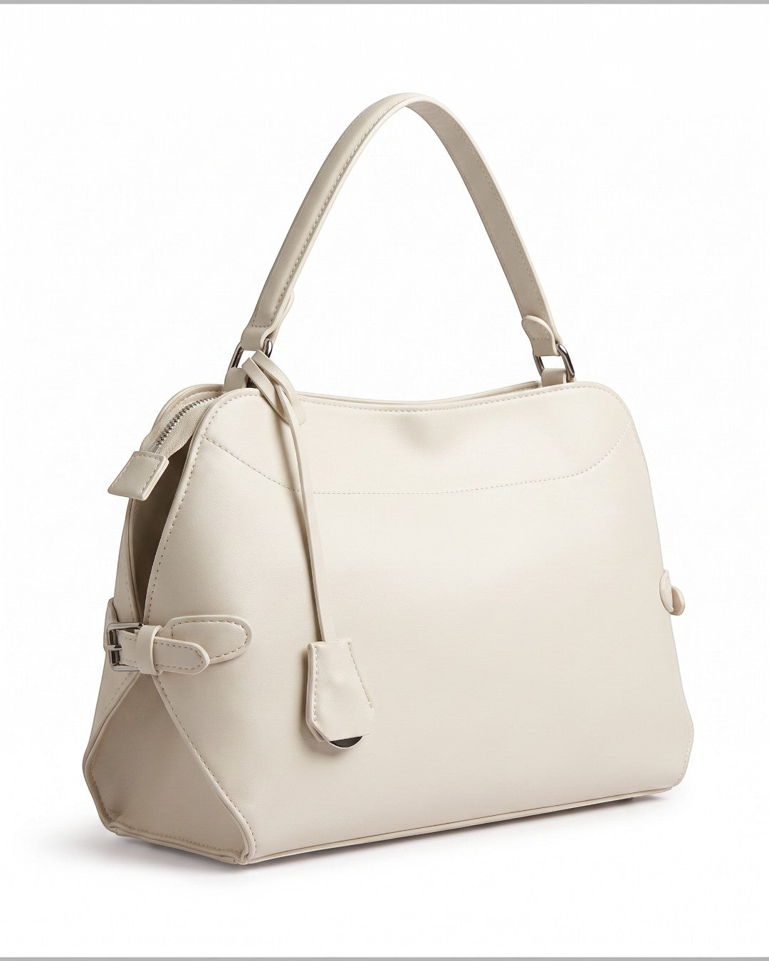 Pine Drew India Celeste hobo bag in cream pure leather with a top handle, gold hardware, and a fluid silhouette.