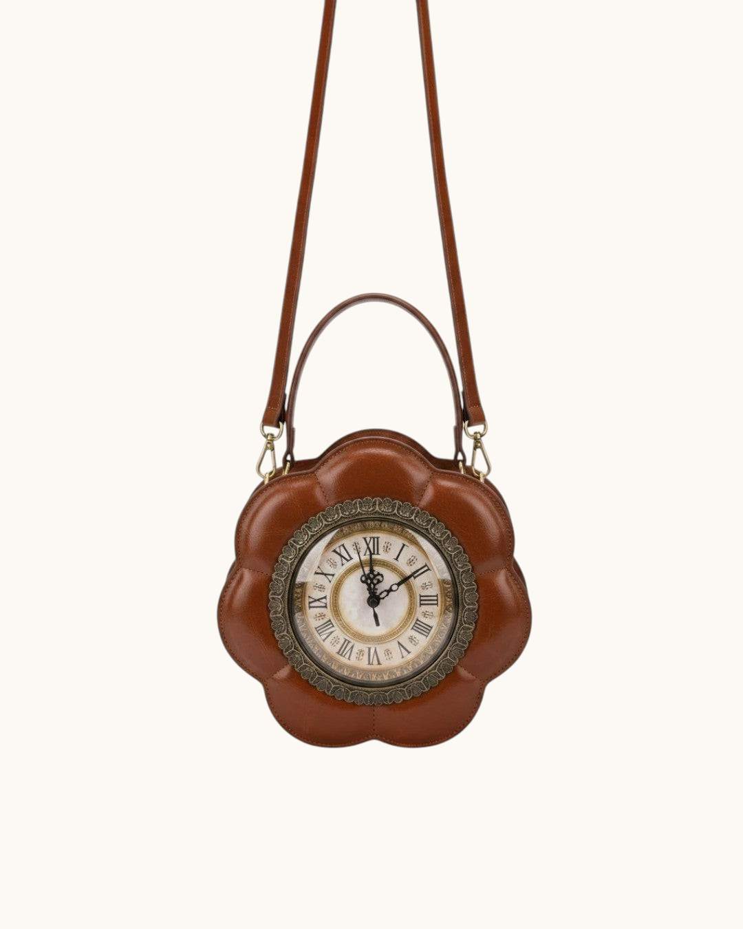 Pine Drew India Tempus Élan cognac vegan leather flower-shaped bag with an antique brass clock face and crossbody strap.