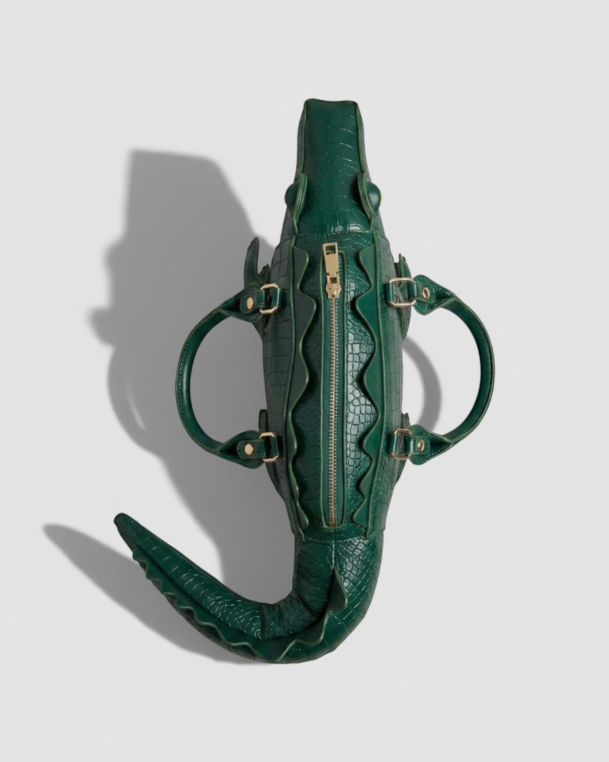 Pine Drew India Crocetta Élan mini handbag in deep green croc-embossed vegan leather with gold hardware top view