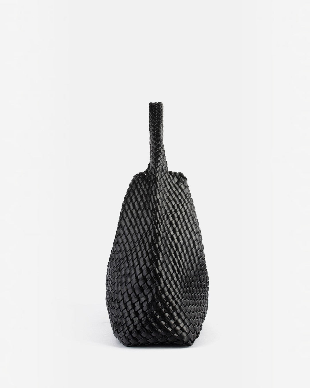 Pine Drew India The Jocelyn black handwoven vegan leather shoulder bag with a slouchy sculptural design.