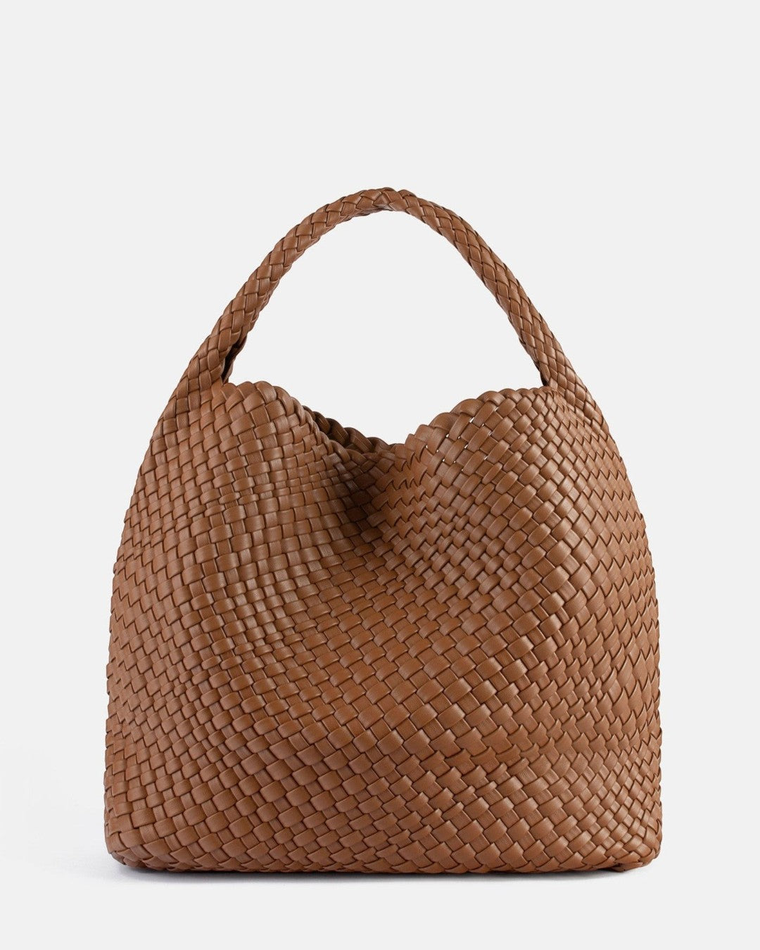 Pine Drew India Jocelyn bag in brown handwoven vegan leather with a slouchy sculptural body and single shoulder handle