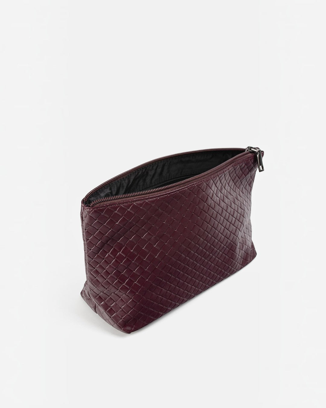 Pine Drew India Jocelyn handwoven burgundy vegan leather pouch with a zip closure and structured flat base