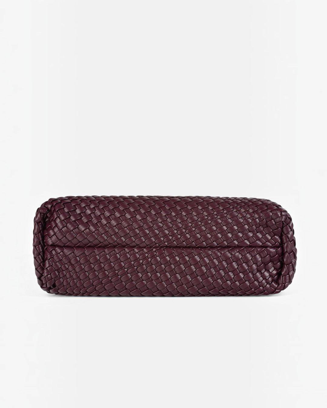 Pine Drew India The Jocelyn bag featuring a deep burgundy handwoven vegan leather base with a flat structured design.