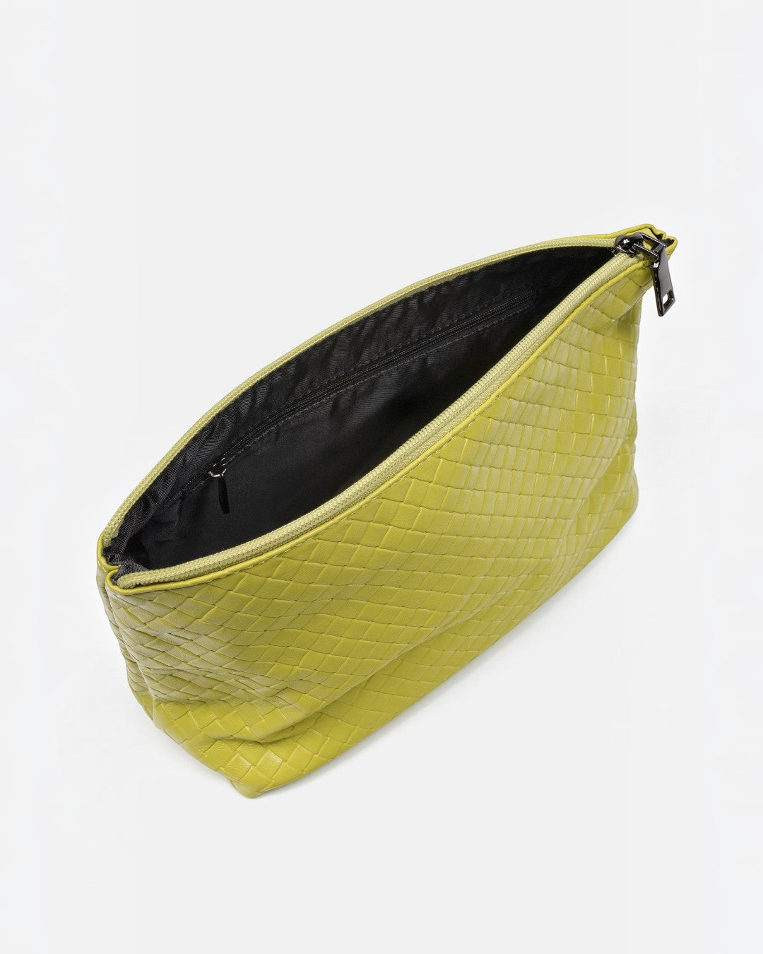 Pine Drew India Jocelyn handwoven lime green vegan leather pouch with a black zippered interior lining