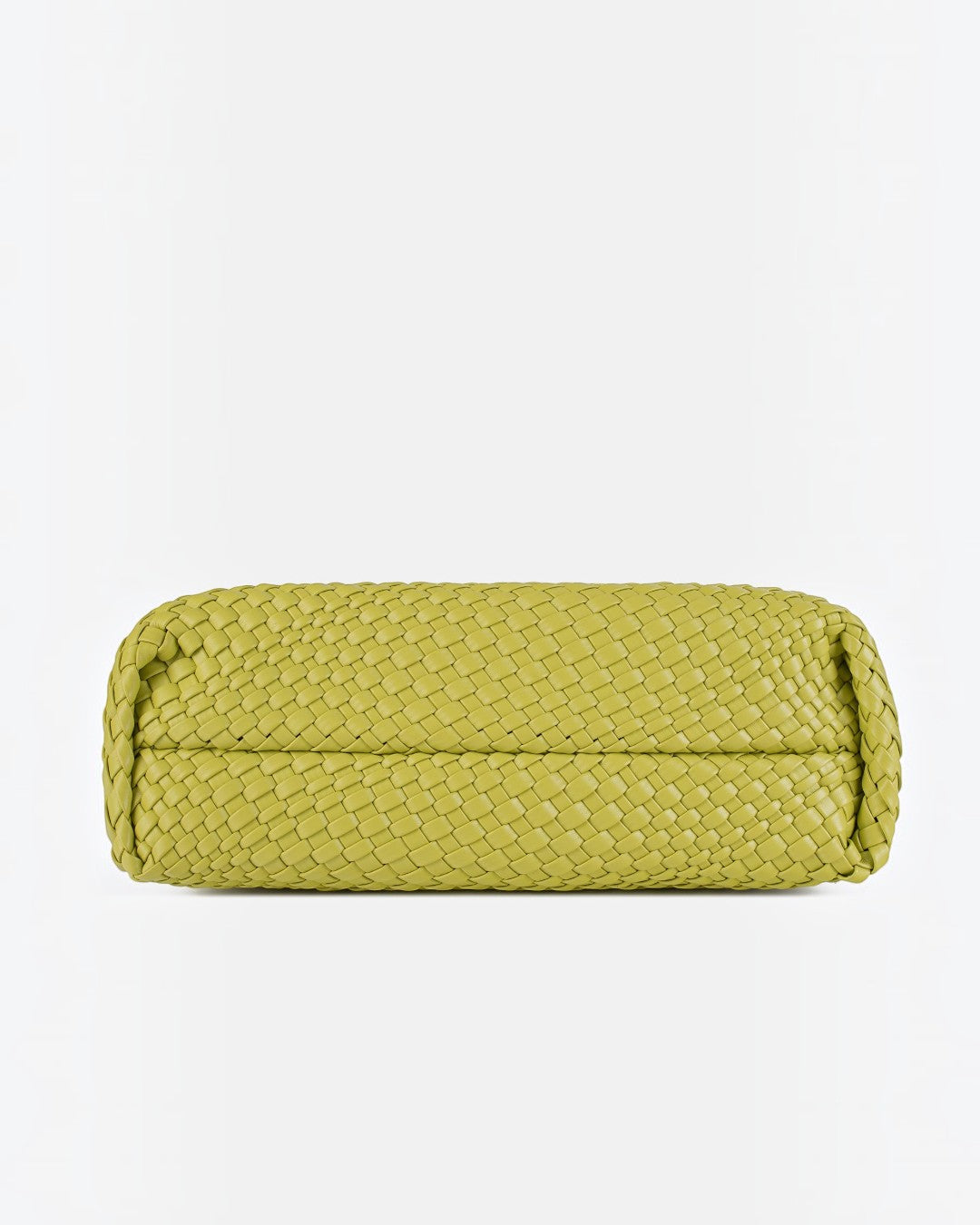 Pine Drew India The Jocelyn bag in lime green handwoven vegan leather with a flat base and sculptural design.