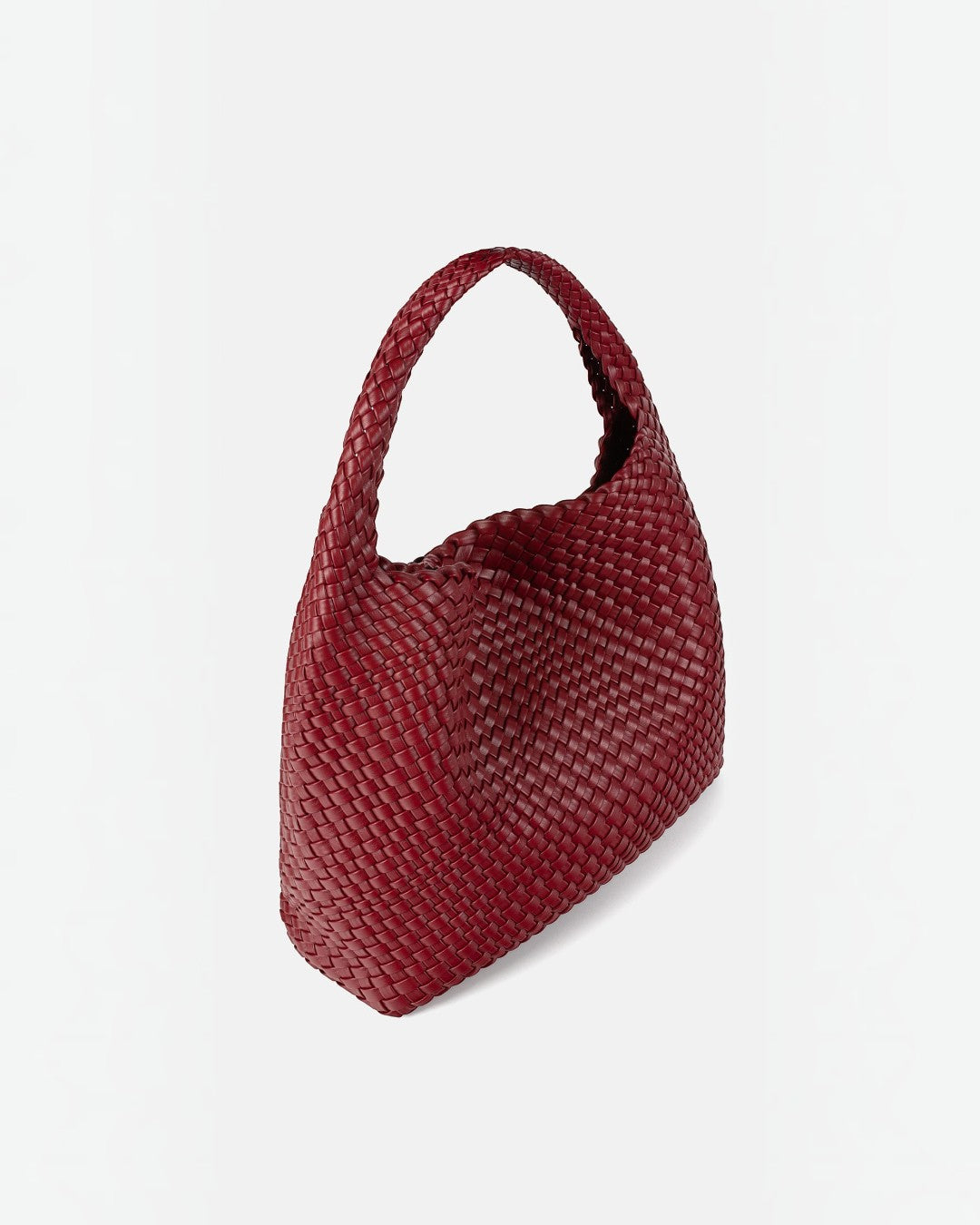 Pine Drew India The Jocelyn bag in deep red handwoven vegan leather with a slouchy sculptural shoulder handle