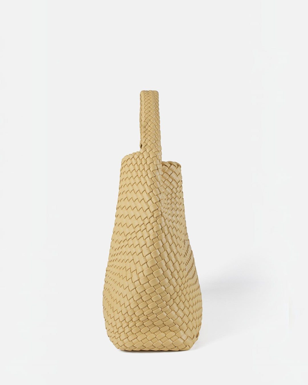 Pine Drew India Jocelyn handwoven beige vegan leather shoulder bag with a slouchy sculptural silhouette.