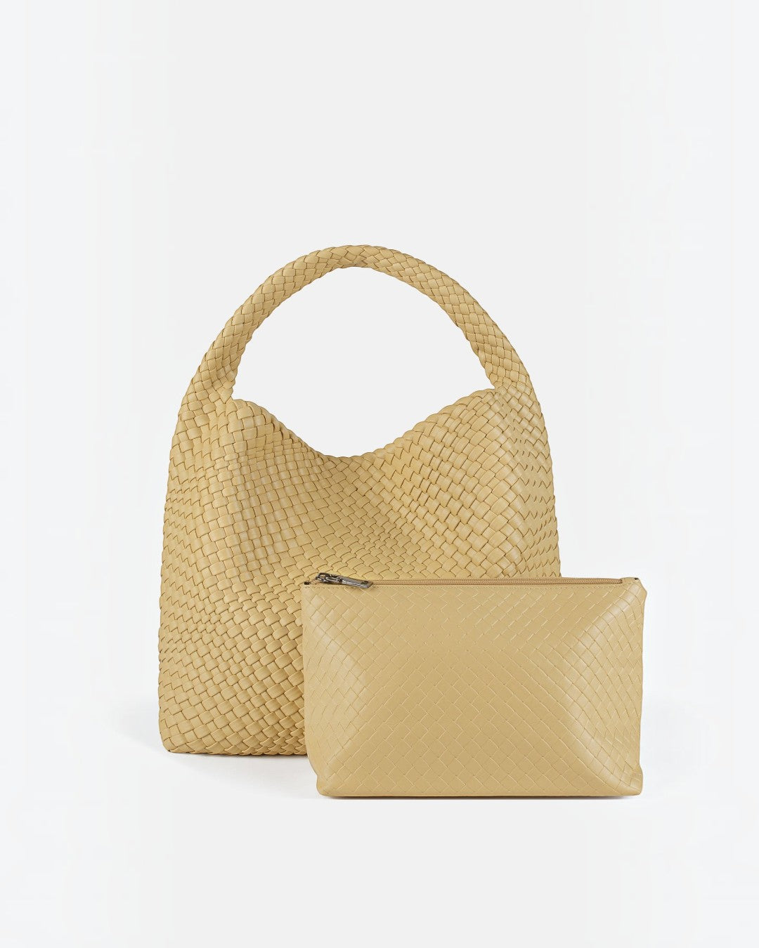 Pine Drew India The Jocelyn handwoven beige vegan leather hobo bag with matching zippered pouch on white background