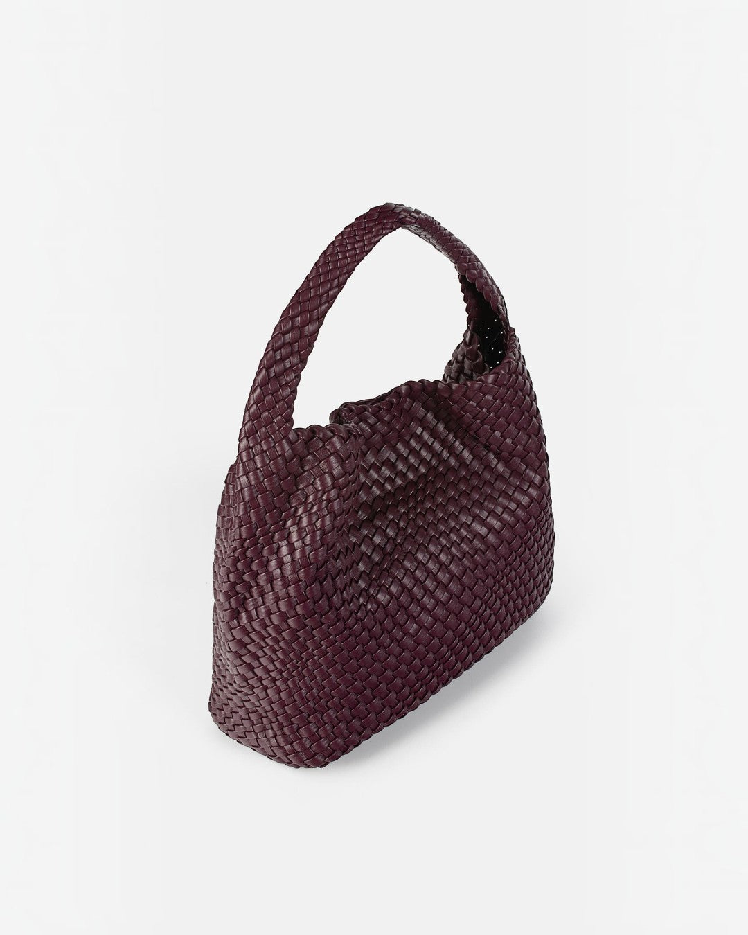 Pine Drew India The Jocelyn handwoven vegan leather shoulder bag in deep burgundy with a slouchy sculptural design