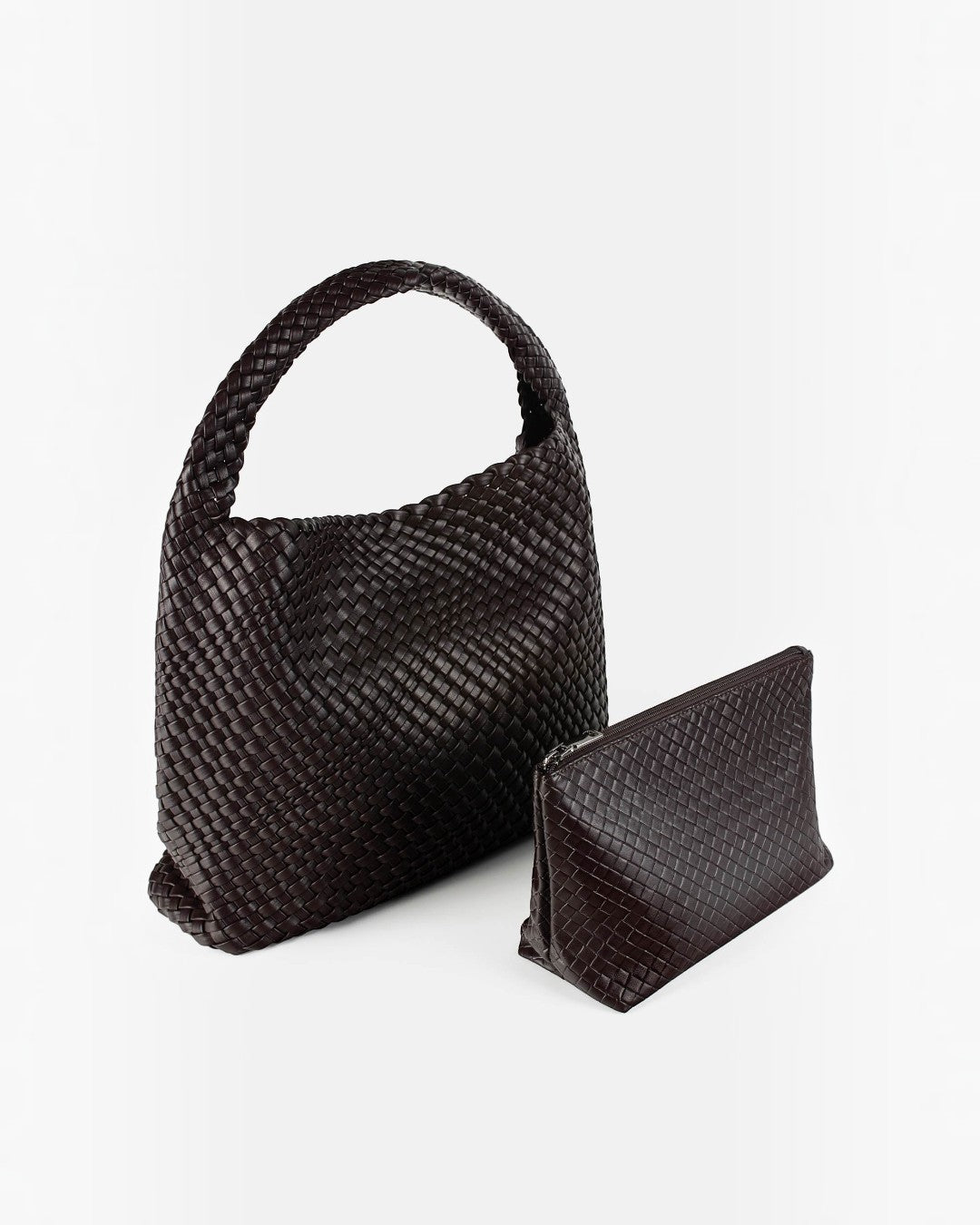 Pine Drew India The Jocelyn handwoven dark brown vegan leather shoulder bag with a matching zippered pouch
