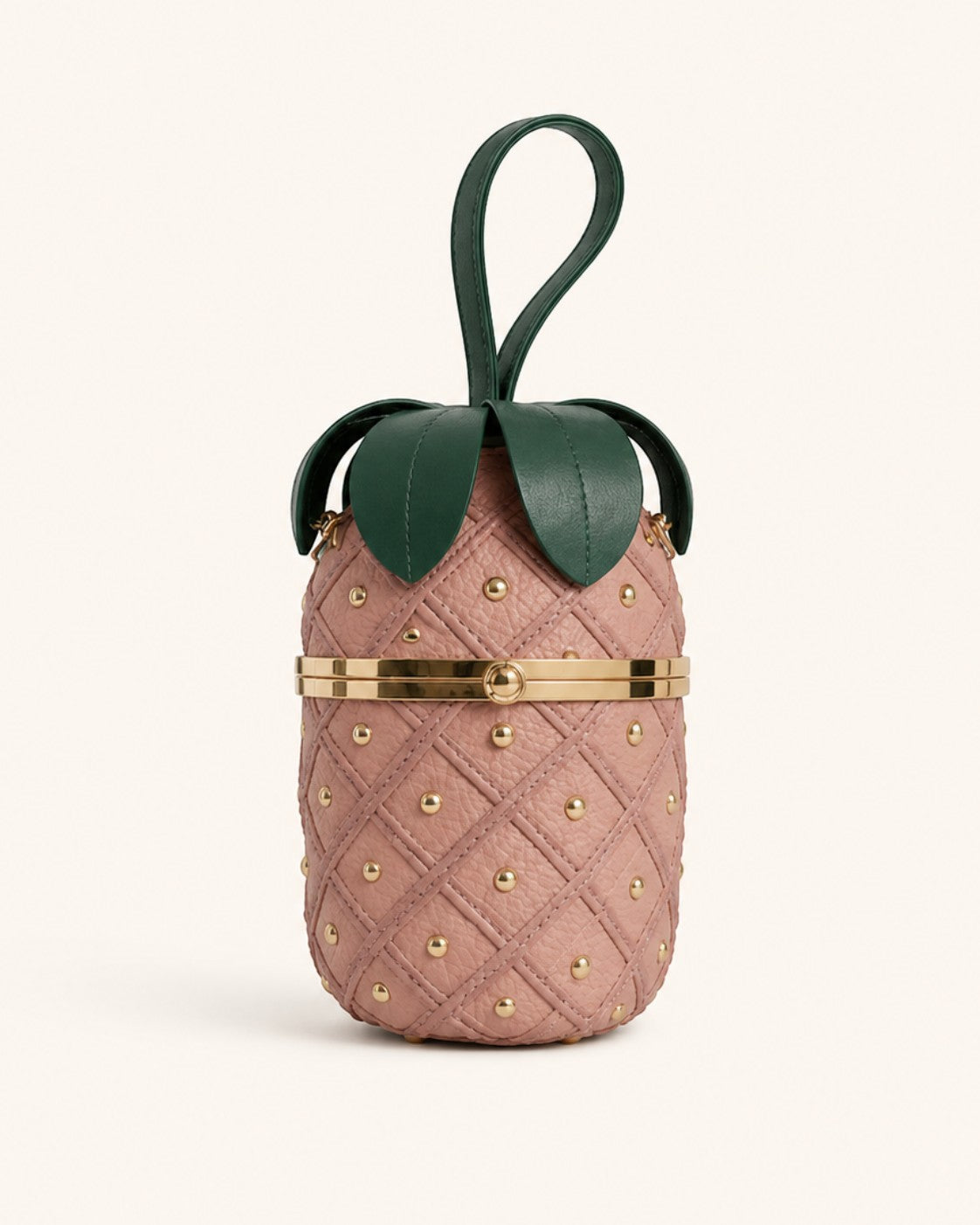 Pine Drew India Palmiera pineapple-shaped vegan leather clutch in pink with gold studs and emerald green leaf top.