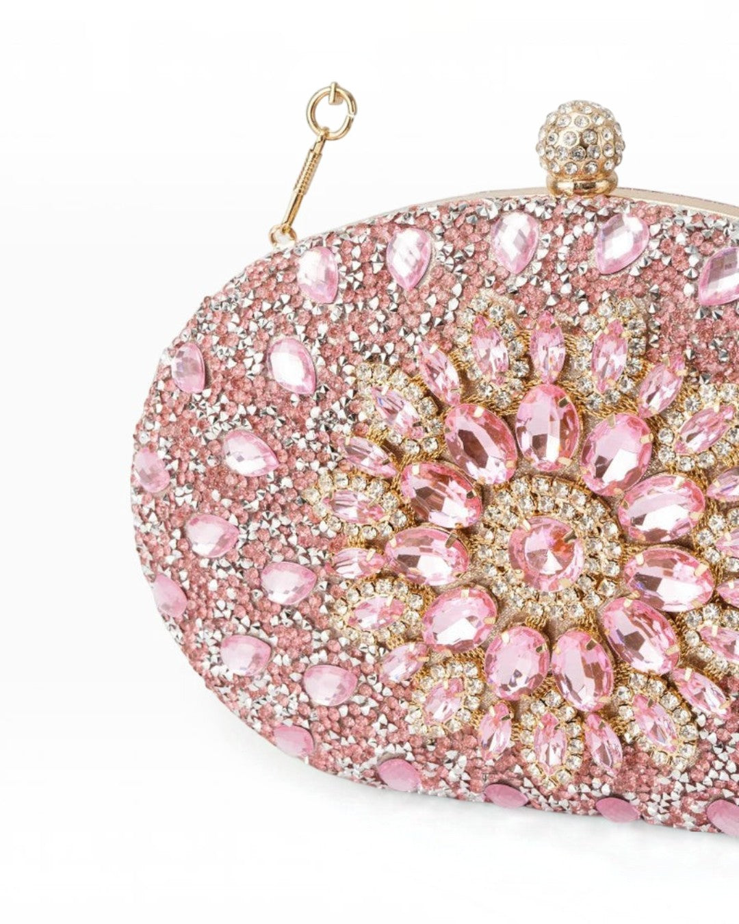 Pine Drew India Colette pink clutch bag encrusted with sparkling crystals and large floral-shaped pink gemstones.