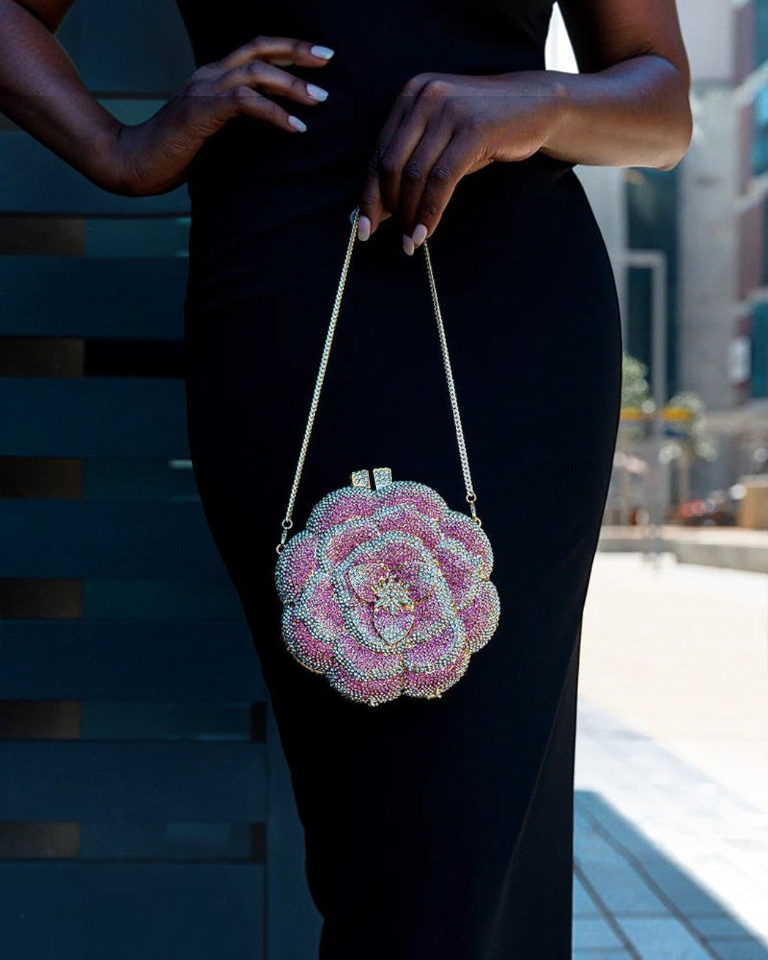 Pine Drew India pink floral clutch bag made of vegan leather with sparkling rhinestone embellishments and gold chain