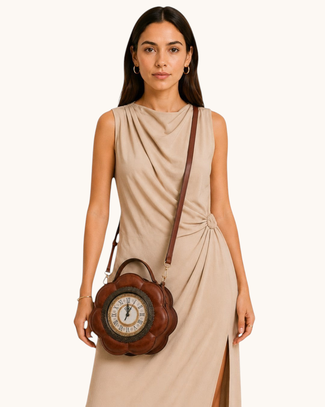 Model wearing a Pine Drew India Tempus Élan cognac vegan leather flower-shaped bag with an antique clock face.