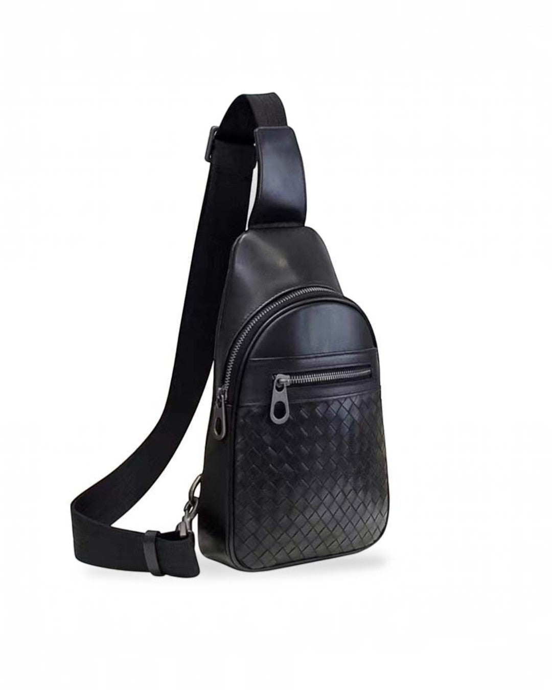 Pine Drew India Woven Voyager black full-grain leather sling bag with intricate woven texture and polished zippers.