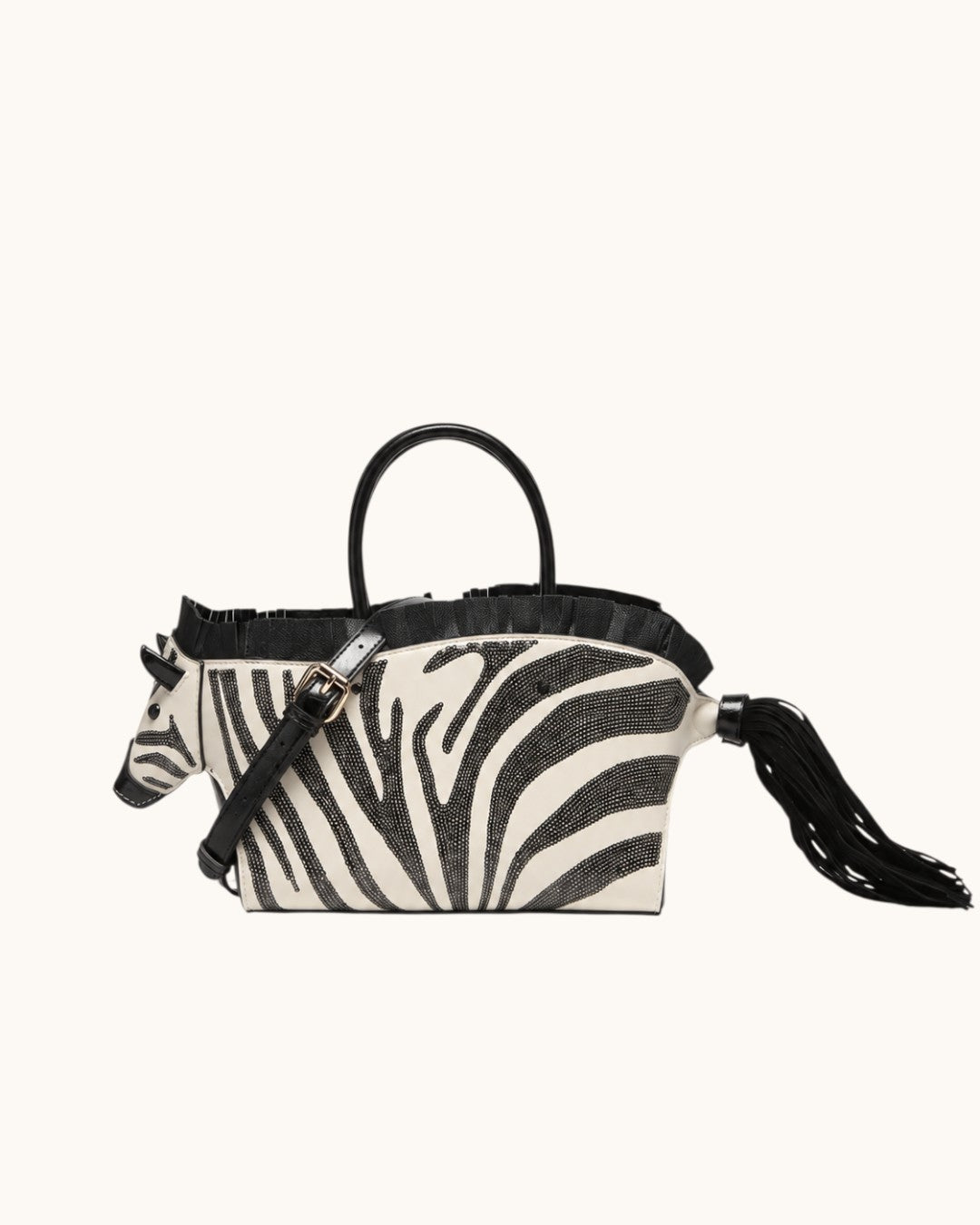 Pine Drew India Zebretta ivory vegan leather handbag with black beaded zebra stripes, pleated mane, and tassel tail.